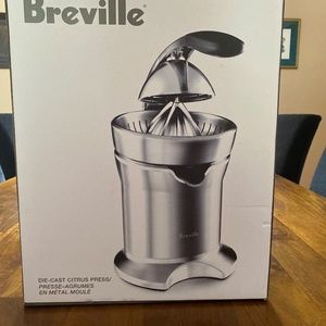 Die-cast citrus press